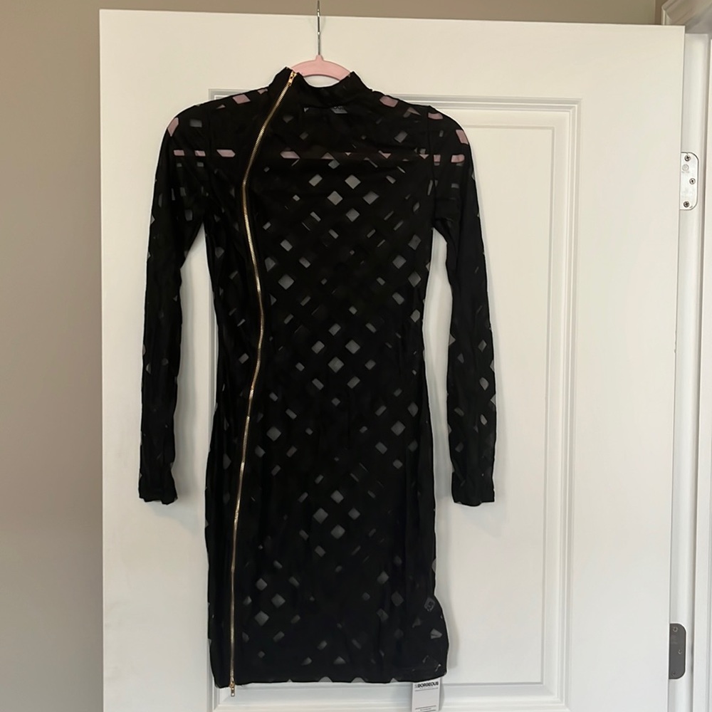 Boutique dress. Black. Semi mesh. Long sleeved. Thin. Minimum stretch.